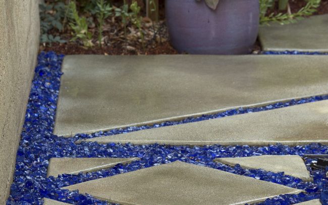 Concrete carpet pathway with recycled glass