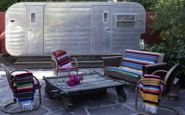 Shell chairs with Mexican blankets