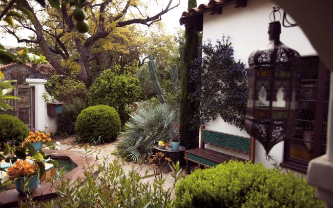 Entry courtyard with early California aesthetic